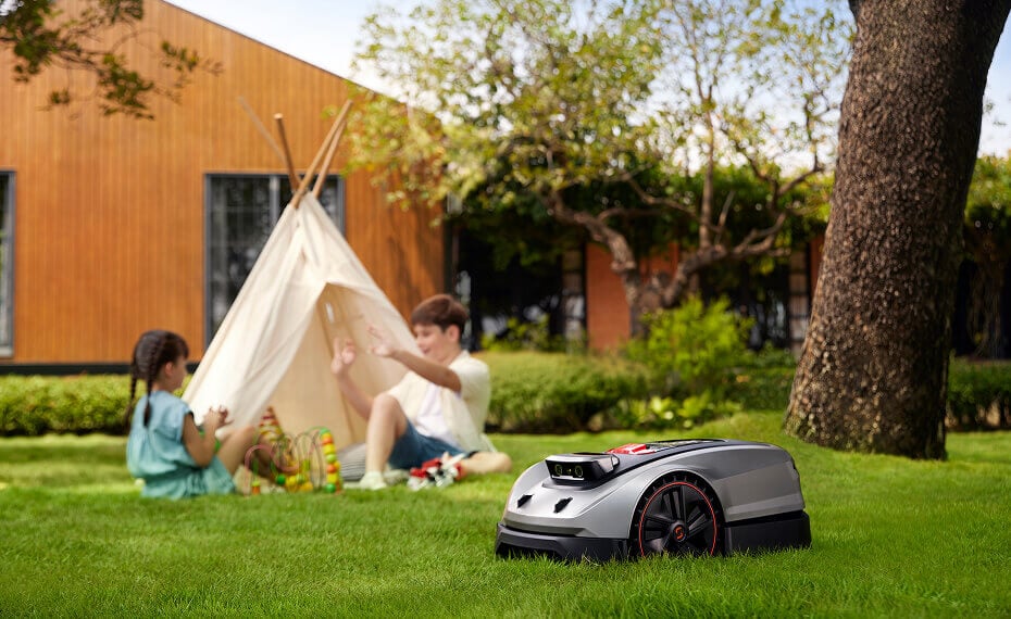 Family enjoying backyard with MoeBot X3